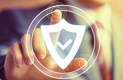 hand pointing to security shield icon