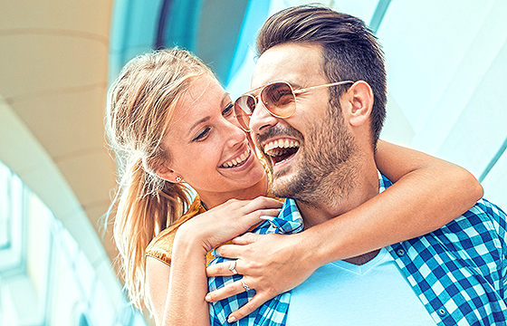 young caucasian couple smiling