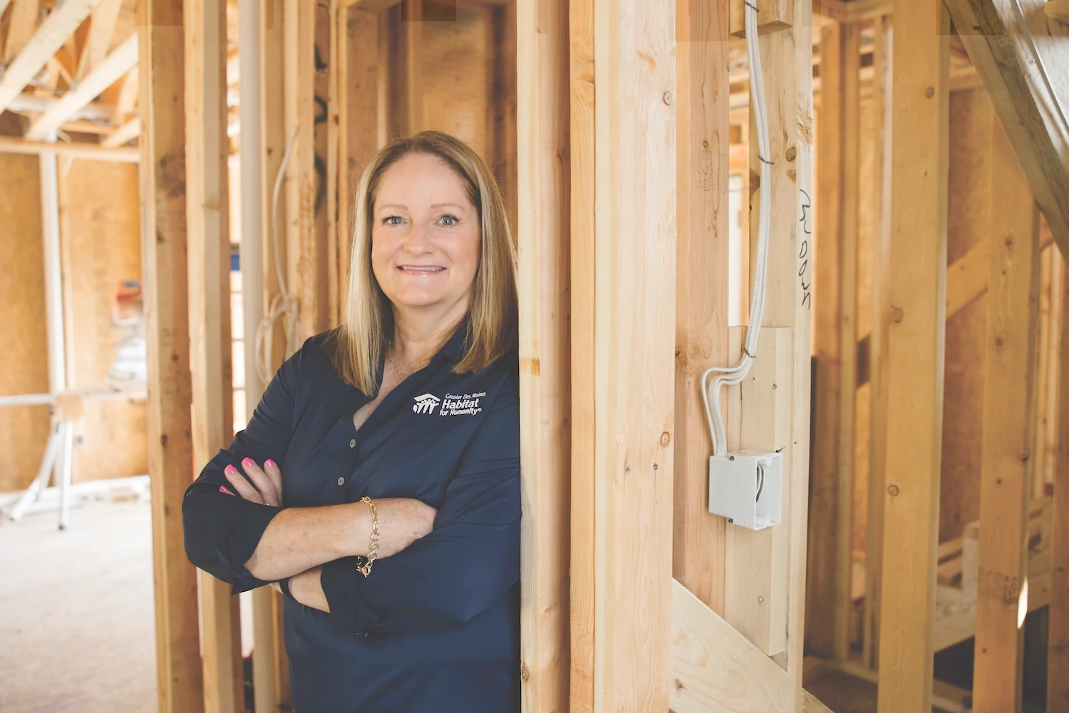 Tina Smith Fritz on a Habitat for Humanity work site