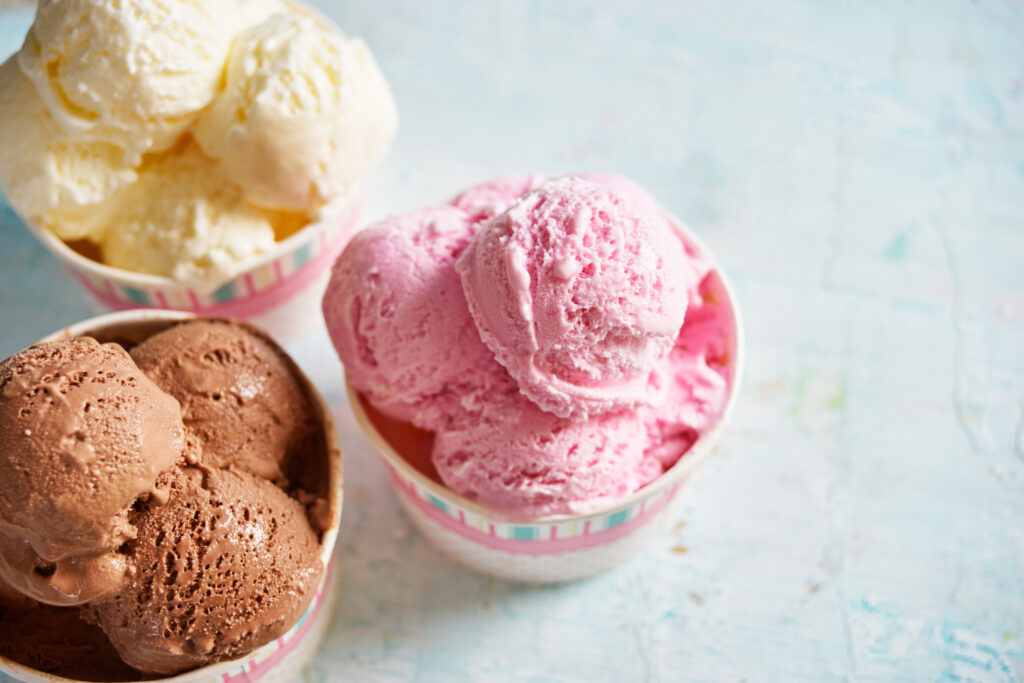Three bowls of ice cream on a counter